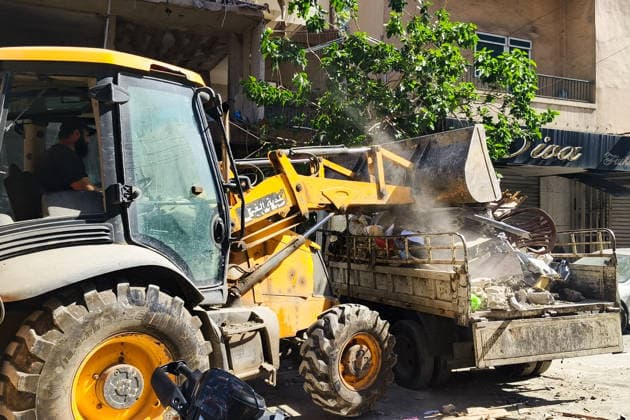 LEBANON, BEIRUT - JUNE 14, 2026: Clearing rubble outside an apartment building south of Beirut after an airstrike. Ankhar Kochneva TASS  93809226
