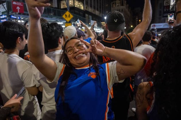 June 14, 2026, New York, United States: A Knicks fan poses during the celebration after the New York Knicks defeated the San Antonio Spurs in Game 5 of the NBA Finals to win the series. The Knicks won the NBA Championship for the first time since 1973, for the third time in franchise history. New York United States - ZUMAs197 20260614_aaa_s197_066 Copyright: xRonxAdarx
