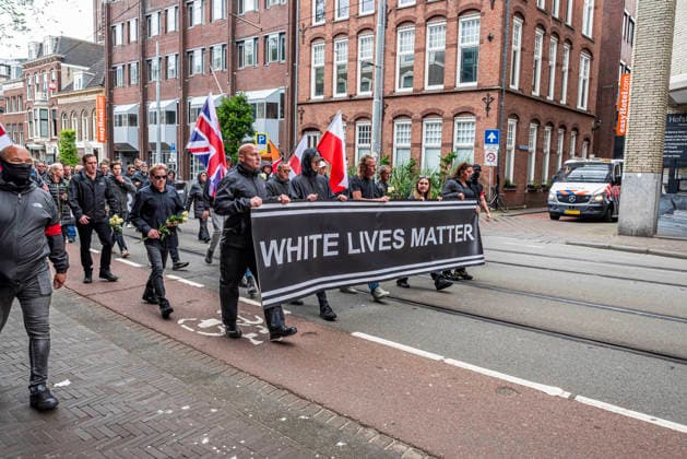 June 14, 2026, Den Haag, South Holland, Netherlands: Den Haag, 14 June 2026. Around 50 far-right demonstrators gathered on Burgemeester Patijnlaan for a memorial march for Henry Nowak (18, British Polish university student). Nowak was killed on 3 December 2025 by Vickrum Singh Digwa in Southampton, England. The march ended at the Embassy of Great Britain, where demonstrators laid a wreath and flowers, and held banners saying Ã¢â‚¬oeJustice for HenryÃ¢â‚¬Â and Ã¢â‚¬oeWhite Lives MatterÃ¢ Den Haag Netherlands  - ZUMAp202 20260614_zip_p202_005 Copyright: xJamesxPetermeierx