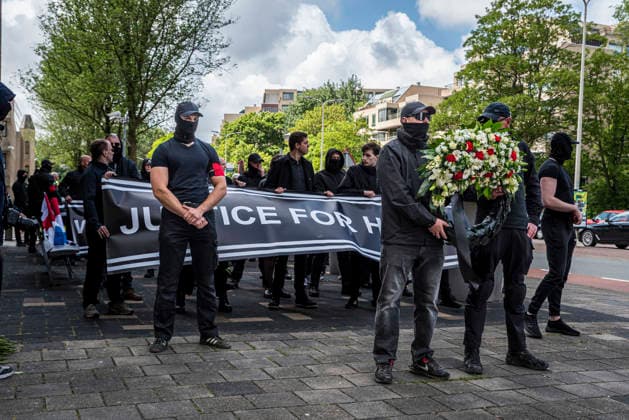 June 14, 2026, Den Haag, South Holland, Netherlands: Den Haag, 14 June 2026. Around 50 far-right demonstrators gathered on Burgemeester Patijnlaan for a memorial march for Henry Nowak (18, British Polish university student). Nowak was killed on 3 December 2025 by Vickrum Singh Digwa in Southampton, England. The march ended at the Embassy of Great Britain, where demonstrators laid a wreath and flowers, and held banners saying Ã¢â‚¬oeJustice for HenryÃ¢â‚¬Â and Ã¢â‚¬oeWhite Lives MatterÃ¢ Den Haag Netherlands  - ZUMAp202 20260614_zip_p202_007 Copyright: xJamesxPetermeierx
