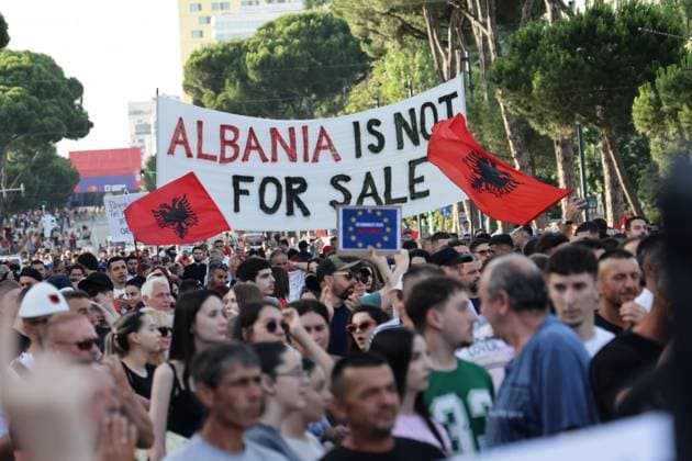 Day 15 Anti-Kushner Resort Protest in Albania TIRANA, ALBANIA JUNE 14, 2026: Environmental activists, civil society groups, families, members of the Albanian diaspora and young people take part in the fifteenth consecutive day of protests against a proposed luxury tourism development project linked to Jared Kushner. Demonstrators gathered outside the Prime Minister™s Office before marching through central Tirana and along major roads across the capital, eventually reaching and blocking the Tirana Durres highway. Protesters carried banners, placards and Albanian flags while calling for the cancellation of the project and raising concerns about its potential environmental impact. Traffic was temporarily disrupted as demonstrators occu Copyright: x xVlasovxSulajx xJNAxPressx