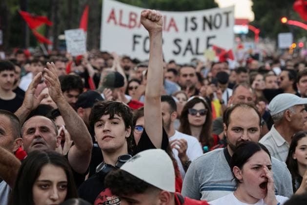Day 15 Anti-Kushner Resort Protest in Albania TIRANA, ALBANIA JUNE 14, 2026: Environmental activists, civil society groups, families, members of the Albanian diaspora and young people take part in the fifteenth consecutive day of protests against a proposed luxury tourism development project linked to Jared Kushner. Demonstrators gathered outside the Prime Minister™s Office before marching through central Tirana and along major roads across the capital, eventually reaching and blocking the Tirana Durres highway. Protesters carried banners, placards and Albanian flags while calling for the cancellation of the project and raising concerns about its potential environmental impact. Traffic was temporarily disrupted as demonstrators occu Copyright: x xVlasovxSulajx xJNAxPressx