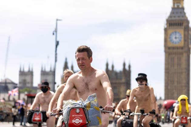 June 14, 2026, London, England, United Kingdom: Naked cyclists ride through Westminster during the annual World Naked Bike Ride, demanding greater respect for cyclists and protesting air pollution. London United Kingdom  - ZUMAs262 20260614_zip_s262_019 Copyright: xTayfunxSalcix