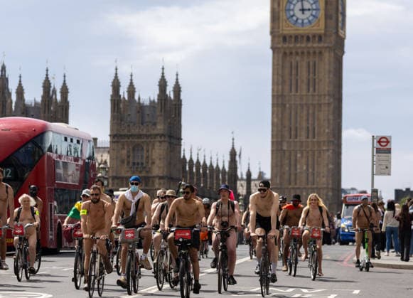 June 14, 2026, London, England, United Kingdom: Naked cyclists ride through Westminster during the annual World Naked Bike Ride, demanding greater respect for cyclists and protesting air pollution. London United Kingdom - ZUMAs262 20260614_zip_s262_020 Copyright: xTayfunxSalcix