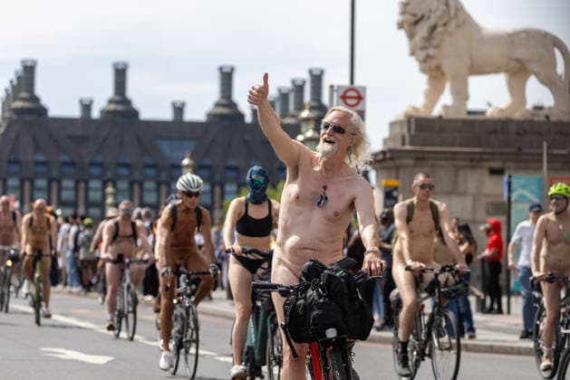 June 14, 2026, London, England, United Kingdom: Naked cyclists ride through Westminster during the annual World Naked Bike Ride, demanding greater respect for cyclists and protesting air pollution. London United Kingdom - ZUMAs262 20260614_zip_s262_027 Copyright: xTayfunxSalcix