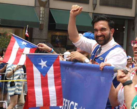 June 14, 2026, New York, New York, USA: NYC Mayor ZOHRAN MAMDANI seen at the 69th Annual National Puerto Rican Parade held on 5th Avenue. New York USA  - ZUMAk03_ 20260614_zaf_k03_043 Copyright: xNancyxKaszermanx