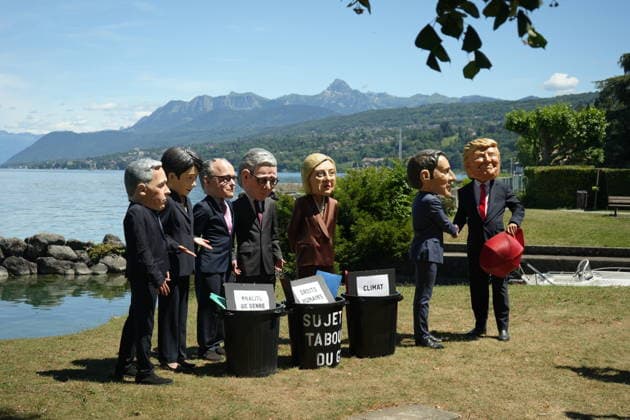 Oxfam protest ahead of G7 Summit in France EVIAN-LES-BAINS, FRANCE - JUNE 14: Activists wearing oversized papier-mache masks depicting world leaders, including U.S. President Donald Trump and French President Emmanuel Macron, take part in an Oxfam demonstration ahead of the G7 Summit in Evian-les-Bains, France, on June 14, 2026. The anti-poverty charity staged the protest to call attention to climate change and gender equality issues ahead of the gathering of G7 leaders. Stringer Anadolu Evian-les-Bains France. Editorial use only. Please get in touch for any other usage.  Copyright: x2026xAnadoluxStringerx