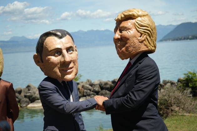 Oxfam protest ahead of G7 Summit in France EVIAN-LES-BAINS, FRANCE - JUNE 14: Activists wearing oversized papier-mache masks depicting world leaders, including U.S. President Donald Trump and French President Emmanuel Macron, take part in an Oxfam demonstration ahead of the G7 Summit in Evian-les-Bains, France, on June 14, 2026. The anti-poverty charity staged the protest to call attention to climate change and gender equality issues ahead of the gathering of G7 leaders. Stringer Anadolu Evian-les-Bains France. Editorial use only. Please get in touch for any other usage.  Copyright: x2026xAnadoluxStringerx