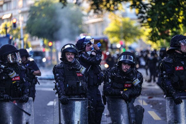 June 14, 2026, Geneva, Switzerland, European Union: Police officers in riot gear stand with partial head exhaustion during demonstrations in Geneva ahead of the G7 summit, which begins tomorrow in Evian-les-Bains. Geneva European Union  - ZUMAo116 20260614_znp_o116_046 Copyright: xBiancaxOterox