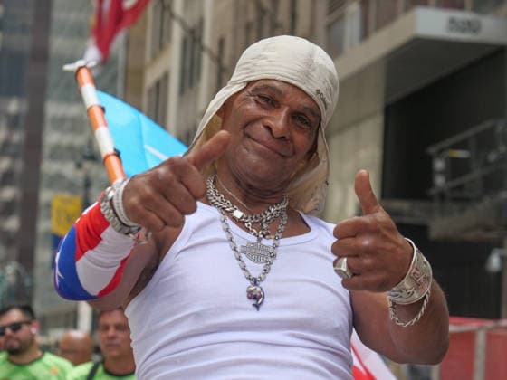 June 14, 2026, New York, New York, USA: Puerto Rican pride at the 69th annual Puerto Rican Day Parade which made its way up Fifth Avenue to a sea of red white and blue celebrating the expansive cultural legacy and global footprint of .Puerto Rico. Salsa music, floats, dance and Puerto Rican pride filled the air as thousands marched and.watched from the sidelines. New York USA  - ZUMAh156 20260614_znp_h156_015 Copyright: xMiloxHessx