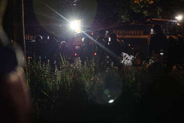June 14, 2026, Geneva, Switzerland, European Union: Police officers in riot gear illuminated by a background light during demonstrations in Geneva ahead of the G7 summit, which begins tomorrow in Evian-les-Bains. Geneva European Union  - ZUMAo116 20260614_znp_o116_074 Copyright: xBiancaxOterox