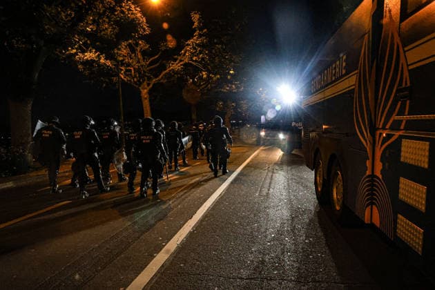 June 14, 2026, Geneva, Switzerland, European Union: Police officers in riot gear walk back to their dispatch vehicles during demonstrations in Geneva ahead of the G7 summit, which begins tomorrow in Evian-les-Bains. Geneva European Union - ZUMAo116 20260614_znp_o116_085 Copyright: xBiancaxOterox