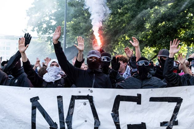 June 14, 2026, Geneva, Canton Of Geneva, Switzerland: Thousands of people took part in the NOG7 demonstration held in Geneva on 14 June. During the protest, shop windows were smashed and a car was set alight, and demonstrators clashed repeatedly with the police. The march, which set off from the lakeside, then made its way through the city centre, passing in front of the UNHCR headquarters, where clashes broke out. Geneva Switzerland - ZUMAs377 20260614_znp_s377_039 Copyright: xPietroxStariccox