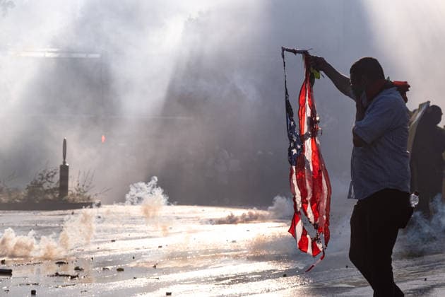 June 14, 2026, Geneva, Canton Of Geneva, Switzerland: Thousands of people took part in the NOG7 demonstration held in Geneva on 14 June. During the protest, shop windows were smashed and a car was set alight, and demonstrators clashed repeatedly with the police. The march, which set off from the lakeside, then made its way through the city centre, passing in front of the UNHCR headquarters, where clashes broke out. Geneva Switzerland - ZUMAs377 20260614_znp_s377_054 Copyright: xPietroxStariccox