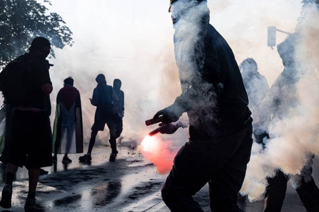 June 14, 2026, Geneva, Canton Of Geneva, Switzerland: Thousands of people took part in the NOG7 demonstration held in Geneva on 14 June. During the protest, shop windows were smashed and a car was set alight, and demonstrators clashed repeatedly with the police. The march, which set off from the lakeside, then made its way through the city centre, passing in front of the UNHCR headquarters, where clashes broke out. Geneva Switzerland - ZUMAs377 20260614_znp_s377_060 Copyright: xPietroxStariccox