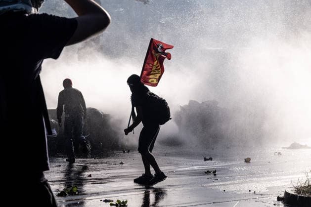 June 14, 2026, Geneva, Canton Of Geneva, Switzerland: Thousands of people took part in the NOG7 demonstration held in Geneva on 14 June. During the protest, shop windows were smashed and a car was set alight, and demonstrators clashed repeatedly with the police. The march, which set off from the lakeside, then made its way through the city centre, passing in front of the UNHCR headquarters, where clashes broke out. Geneva Switzerland - ZUMAs377 20260614_znp_s377_064 Copyright: xPietroxStariccox