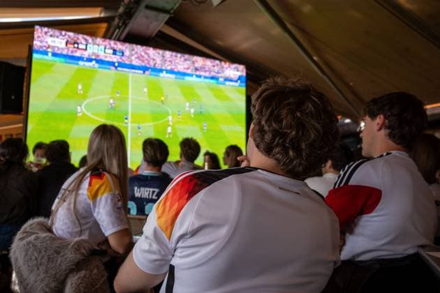 World Cup Public Viewing in Düsseldorf Germany DÜSSELDORF, GERMANY June 14, 2026: Football fans celebrate during a public viewing event in Düsseldorf as Germany defeats Curacao 7 1 in their FIFA World Cup 2026 Group E match. Thousands of supporters gathered to watch the game on large screens, creating a festive atmosphere as Germany opened its World Cup campaign with a convincing victory. Photo by Mouafak Mahmalji Jna press (Photo by Mouafak Mahmalji JNA Press via Nexpher Images) DoÂ¼sseldorf