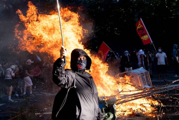 June 14, 2026, Geneva, Canton Of Geneva, Switzerland: Thousands of people took part in the NOG7 demonstration held in Geneva on 14 June. During the protest, shop windows were smashed and a car was set alight, and demonstrators clashed repeatedly with the police. The march, which set off from the lakeside, then made its way through the city centre, passing in front of the UNHCR headquarters, where clashes broke out. Geneva Switzerland - ZUMAs377 20260614_znp_s377_067 Copyright: xPietroxStariccox