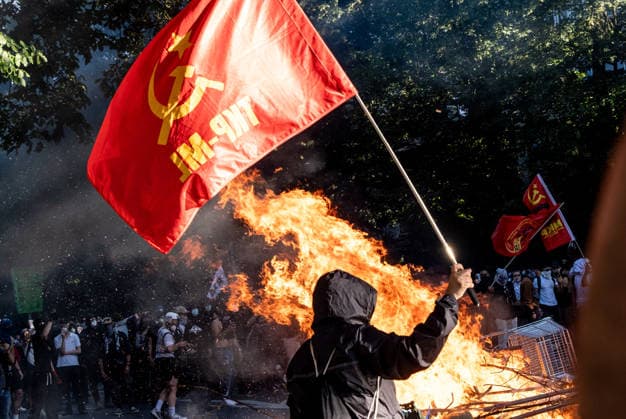 June 14, 2026, Geneva, Canton Of Geneva, Switzerland: Thousands of people took part in the NOG7 demonstration held in Geneva on 14 June. During the protest, shop windows were smashed and a car was set alight, and demonstrators clashed repeatedly with the police. The march, which set off from the lakeside, then made its way through the city centre, passing in front of the UNHCR headquarters, where clashes broke out. Geneva Switzerland - ZUMAs377 20260614_znp_s377_068 Copyright: xPietroxStariccox