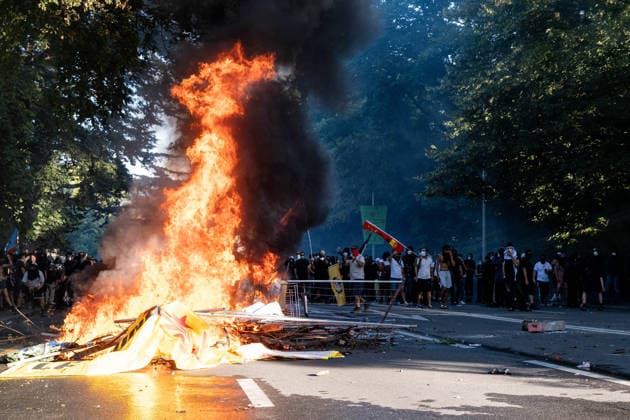 June 14, 2026, Geneva, Canton Of Geneva, Switzerland: Thousands of people took part in the NOG7 demonstration held in Geneva on 14 June. During the protest, shop windows were smashed and a car was set alight, and demonstrators clashed repeatedly with the police. The march, which set off from the lakeside, then made its way through the city centre, passing in front of the UNHCR headquarters, where clashes broke out. Geneva Switzerland - ZUMAs377 20260614_znp_s377_069 Copyright: xPietroxStariccox