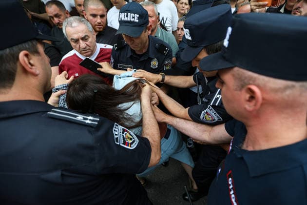 Armenian Protest Against Elections Results in Yerevan - 14 Jun 2026 Police detained a woman during the rally. Armenia’s Central Election Commission (CEC) has certified the results of the June 7 parliamentary elections, confirming that Prime Minister Nikol Pashinyan’s Civil Contract party secured 49.74% of the vote, enough to form a government independently without coalition partners. The Prosperous Armenia party, led by billionaire Gagik Tsarukyan, narrowly failed to clear the 4% parliamentary threshold and called on its supporters to gather outside the CEC building in protest. Opposition, rejecting the outcome as illegitimate, addressed crowds demanding a rerun of the vote. Yerevan Armenia Copyright: xYanxKhachkox xSOPAxImagesx KHA_0108