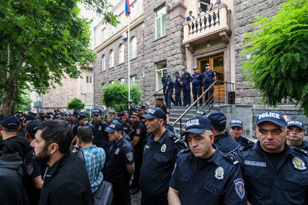 Armenian Protest Against Elections Results in Yerevan - 14 Jun 2026 Armenian Police protects entrance to the Central Election Commission from protestors. Armenia’s Central Election Commission (CEC) has certified the results of the June 7 parliamentary elections, confirming that Prime Minister Nikol Pashinyan’s Civil Contract party secured 49.74% of the vote, enough to form a government independently without coalition partners. The Prosperous Armenia party, led by billionaire Gagik Tsarukyan, narrowly failed to clear the 4% parliamentary threshold and called on its supporters to gather outside the CEC building in protest. Opposition, rejecting the outcome as illegitimate, addressed crowds demanding a rerun of the vote. Yerevan Armenia Copyright: xYanxKhachkox xSOPAxImagesx KHA_0025