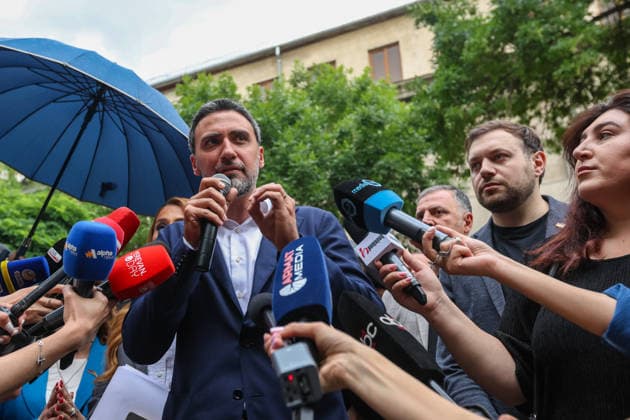 June 14, 2026, Yerevan, Armenia: Lawyer Aram Vardevanyan talks to journalists during the rally. Armenia™s Central Election Commission (CEC) has certified the results of the June 7 parliamentary elections, confirming that Prime Minister Nikol Pashinyan™s Civil Contract party secured 49.74% of the vote, enough to form a government independently without coalition partners. The Prosperous Armenia party, led by billionaire Gagik Tsarukyan, narrowly failed to clear the 4% parliamentary threshold and called on its supporters to gather outside the CEC building in protest. Opposition, rejecting the outcome as illegitimate, addressed crowds demanding a rerun of the vote. Yerevan Armenia  - ZUMAs197 20260614_aaa_s197_250 Copyright: xYanxKhachkox