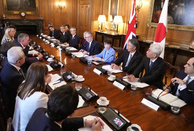 Japan PM Takaichi at roundtable meeting in London Japanese Prime Minister Sanae Takaichi (4th from R) and her British counterpart Keir Starmer (5th from R) attend a business roundtable meeting in Downing Street in London on June 14, 2026. (Pool photo)  A14AA0005618810P