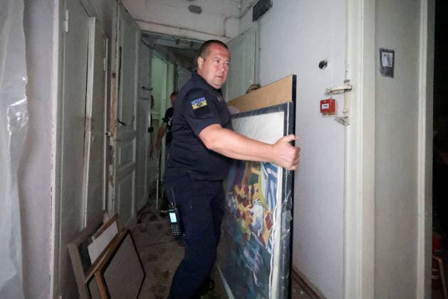 A man carries paintings at the Kharkiv Art Museum, damaged by a Russian drone strike, Kharkiv, Ukraine, June 14, 2026. The Russian army attacked the northeastern city with drones, injuring five people, including a one-month-old baby. On the afternoon of June 14, Russians struck two districts of Kharkiv with drones. (Photo by Viacheslav Madiievskyi Ukrinform) Russians strike Kharkiv Art Museum with drone  Copyright: xViacheslavxMadiievskyix