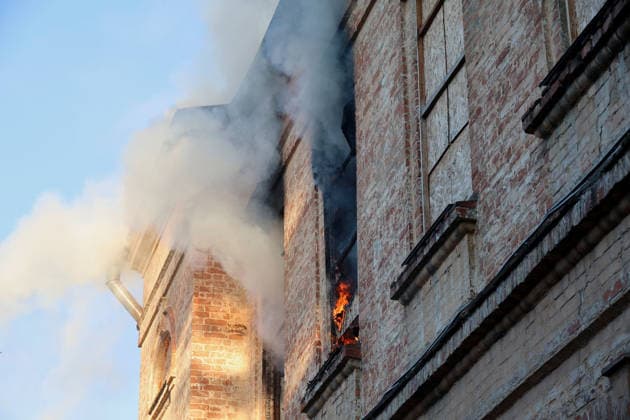 Smoke rises from the Kharkiv Art Museum, damaged by a Russian drone strike, Kharkiv, Ukraine, June 14, 2026. The Russian army attacked the northeastern city with drones, injuring five people, including a one-month-old baby. On the afternoon of June 14, Russians struck two districts of Kharkiv with drones. (Photo by Viacheslav Madiievskyi Ukrinform) Russians strike Kharkiv Art Museum with drone  Copyright: xViacheslavxMadiievskyix