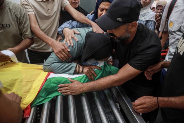 Funeral ceremony held for Palestinians killed in Israeli attacks on Gaza GAZA CITY, GAZA, PALESTINE - JUNE 15: Citizens and relatives of the Palestinians, who died as a result of the Israeli attack on Jabalia Refugee Camp despite the ceasefire, mourn as the bodies are brought to the Al-Shifa Hospital for funeral procedures in Gaza City, Gaza, Palestine on June 15, 2026. Abdalhkem Abu Riash Anadolu Gaza City Gaza. Editorial use only. Please get in touch for any other usage.  Copyright: x2026xAnadoluxAbdalhkemxAbuxRiashx