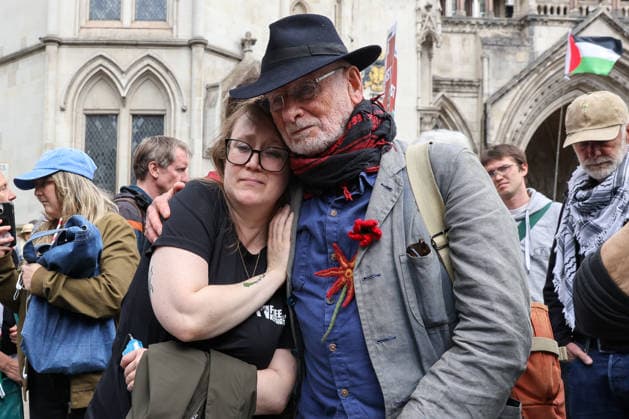 June 15, 2026, London, London, UK: London, UK. People react outside the Royal Courts of Justice in central London as they listen to court proceedings after the Court of Appeal ruled that the government s proscription of Palestine Action as a terrorist organisation is lawful, upholding the ban following a legal challenge. London UK  - ZUMAl94_ 20260615_zaf_l94_020 Copyright: xDinendraxHariax