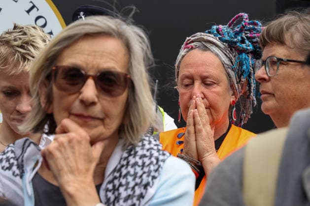 June 15, 2026, London, London, UK: London, UK. People react outside the Royal Courts of Justice in central London as they listen to court proceedings after the Court of Appeal ruled that the government s proscription of Palestine Action as a terrorist organisation is lawful, upholding the ban following a legal challenge. London UK  - ZUMAl94_ 20260615_zaf_l94_023 Copyright: xDinendraxHariax