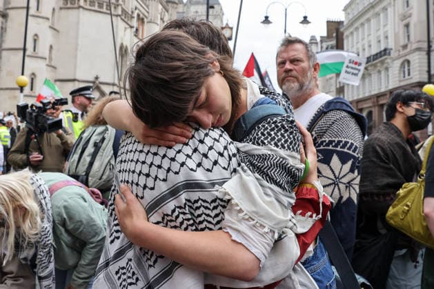 June 15, 2026, London, London, UK: London, UK. People react outside the Royal Courts of Justice in central London as they listen to court proceedings after the Court of Appeal ruled that the government s proscription of Palestine Action as a terrorist organisation is lawful, upholding the ban following a legal challenge. London UK  - ZUMAl94_ 20260615_zaf_l94_033 Copyright: xDinendraxHariax