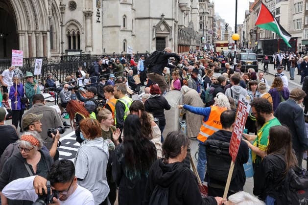 June 15, 2026, London, London, UK: London, UK. Supporters of Palestine Action during a protest outside the Royal Courts of Justice in London ahead of the court s judgment on the government s appeal over the proscription of Palestine Action under terrorism laws. London UK  - ZUMAl94_ 20260615_zaf_l94_042 Copyright: xDinendraxHariax