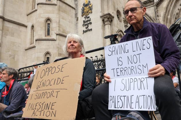 June 15, 2026, London, London, UK: London, UK. Supporters of Palestine Action hold placards during a protest outside the Royal Courts of Justice in London ahead of the court s judgment on the government s appeal over the proscription of Palestine Action under terrorism laws. London UK  - ZUMAl94_ 20260615_zaf_l94_047 Copyright: xDinendraxHariax