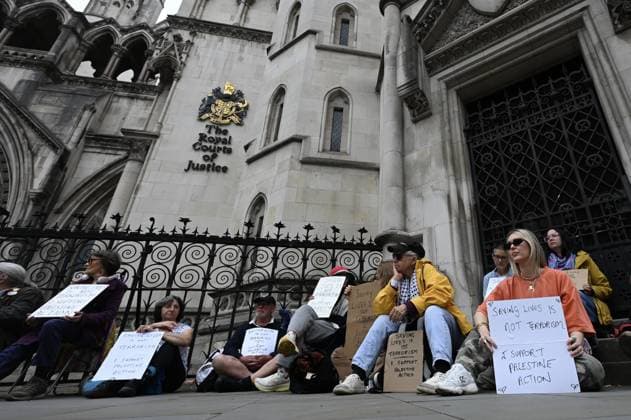 Lift The Ban protest in London ahead of the Palestine Action trial LONDON, UNITED KINGDOM - JUNE 15: Pro-Palestinian demonstrators gather outside the Royal Courts of Justice, holding flags and banners, to demand the lifting of the ban on the direct action group Palestine Action ahead of a landmark ruling in London, United Kingdom, on June 15, 2026. Rasid Necati Aslim Anadolu London United Kingdom. Editorial use only. Please get in touch for any other usage.  Copyright: x2026xAnadoluxRasidxNecatixAslimx
