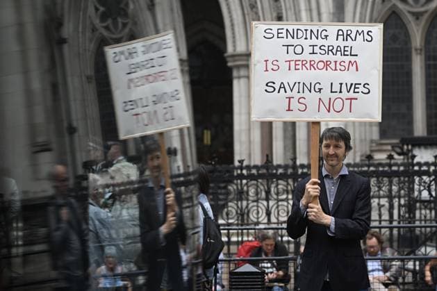 UK Court of Appeal upholds ban on Palestine Action LONDON, UNITED KINGDOM - JUNE 15: Demonstrators, holding banners and placards, gather outside the Royal Courts of Justice during a Lift The Ban protest organized by Defend Our Juries, following a Court of Appeal ruling that upheld the legality of the ban on Palestine Action, a group known for targeting companies linked to Israel, in London, United Kingdom, on June 15, 2026. Rasid Necati Aslim Anadolu London United Kingdom. Editorial use only. Please get in touch for any other usage.  Copyright: x2026xAnadoluxRasidxNecatixAslimx