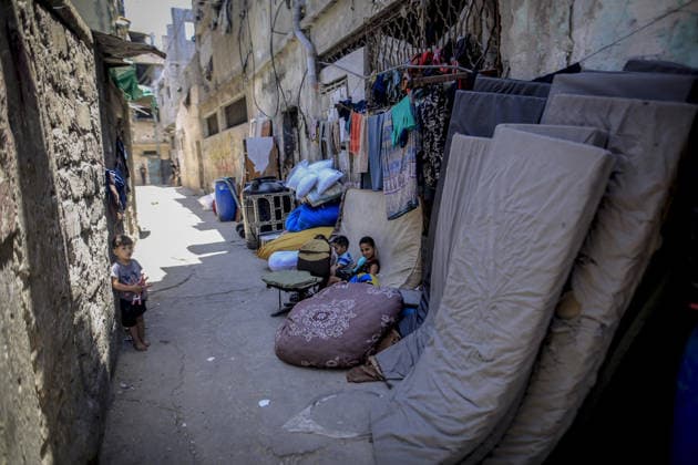 Israel plans to widen Gaza’s ‘yellow line,’ shrinking available living space for Palestinians GAZA CITY, GAZA, PALESTINE - JUNE 15: Palestinians, living in the Sanafur area of the Tuffah neighborhood, flee with their belongings due to the advance of Israeli military vehicles and the installation of concrete barriers marking the boundary known as the yellow line in Gaza City, Gaza, Palestine on June 15, 2026. Plans by the Israeli army to expand the areas under its control in Gaza are increasing concerns among Palestinians living in the region about a new wave of forced displacement and the further reduction of available living space. Saeed M. M. T. Jaras Anadolu Gaza City Gaza. Editorial use only. Please get in touch for any other usage.  Copyright: x2026xAnadoluxSaeedxM.xM.xT.xJarasx