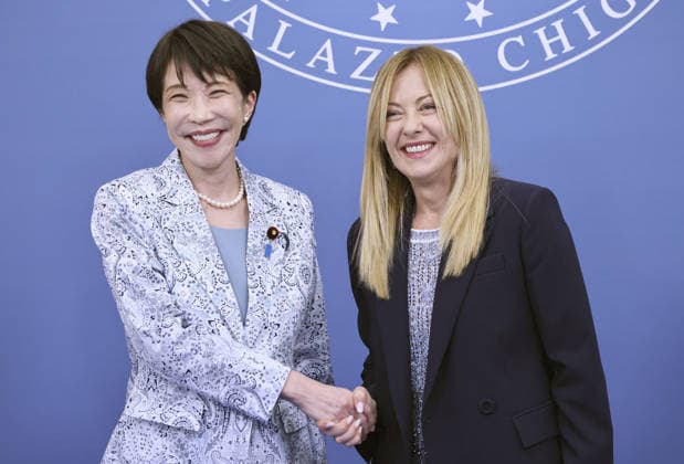 Japan-Italy summit Japanese Prime Minister Sanae Takaichi (L) shakes hands with her Italian counterpart Giorgia Meloni during a joint press event held following their talks in Rome on June 15, 2026. (Pool photo)  A14AA0005618923P