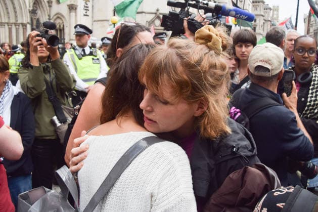 June 15, 2026, London, England, United Kingdom: Protesters react outside the Royal Courts of Justice as the ban on the activist group Palestine Action is ruled as lawful by the Court of Appeal. Judges have overturned a previous ruling that the ban on the group was wrong. London United Kingdom  - ZUMAv130 20260615_zip_v130_002 Copyright: xVukxValcicx