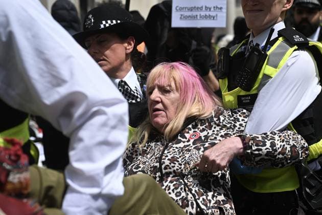 UK Court of appeal s Palestine Action decision protested in London LONDON, UK - JUNE 15: Metropolitan Police officers detain a pro-Palestine demonstrator outside the Royal Courts of Justice in London, United Kingdom on June 15, 2026. A protest was staged following the UK Court of Appeal s decision to uphold the government s ruling to designate the activist group Palestine Action as a terrorist organization, leading to police intervention and multiple arrests. Rasid Necati Aslim Anadolu London United Kingdom. Editorial use only. Please get in touch for any other usage.  Copyright: x2026xAnadoluxRasidxNecatixAslimx