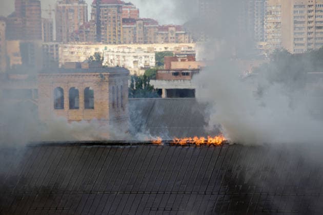 Massive Russian Attack Damages Kyiv Pechersk Lavra and Mystetskyi Arsenal - Kyiv Flames are seen on the roof of the Mystetskyi Arsenal National Cultural, Art and Museum Complex, damaged by a massive Russian combined attack, Kyiv, Ukraine, June 15, 2026. The Russian army launched a large-scale assault on the Ukrainian capital with missiles and strike drones, killing four people and injuring 28, including children and a pregnant woman. At least 140,000 consumers were left without electricity due to damage to power grids. Residential buildings, the Kyiv Pechersk Lavra, the Mystetskyi Arsenal Museum Complex, the Dovzhenko Film Studio, and the building of the High Anti-Corruption Court sustained damage. (Photo by Marianna Kotyk Ukrinform ABACAPR  Copyright: xUkrinform ABACAx