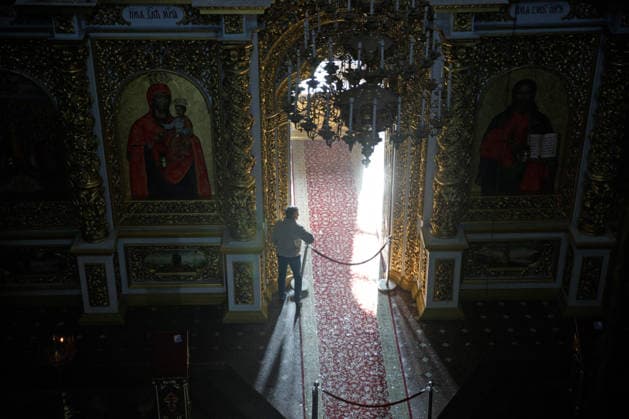 Massive Russian Attack Damages Kyiv Pechersk Lavra and Mystetskyi Arsenal - Kyiv A man is inside the Dormition Cathedral at the Kyiv Pechersk Lavra, where the roof caught fire during a massive Russian combined attack, Kyiv, Ukraine, June 15, 2026. The Russian army launched a large-scale assault on the Ukrainian capital with missiles and strike drones, killing four people and injuring 28, including children and a pregnant woman. At least 140,000 consumers were left without electricity due to damage to power grids. Residential buildings, the Kyiv Pechersk Lavra, the Mystetskyi Arsenal Museum Complex, the Dovzhenko Film Studio, and the building of the High Anti-Corruption Court sustained damage. (Photo by Marianna Kotyk Ukrinform ABACAPRESS.CO  Copyright: xUkrinform ABACAx