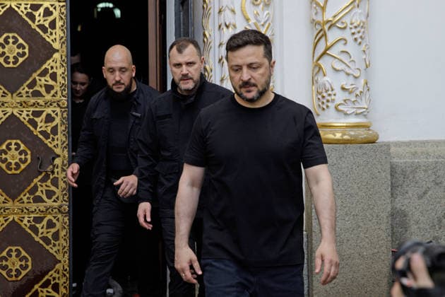 President of Ukraine Volodymyr Zelenskyy (R) and Minister of Internal Affairs of Ukraine Ihor Klymenko (C) visit the Kyiv Pechersk Lavra, where the roof of the Dormition Cathedral caught fire during a massive Russian combined attack, Kyiv, Ukraine, June 15, 2026. The Russian army launched a large-scale assault on the Ukrainian capital with missiles and strike drones, killing four people and injuring 28, including children and a pregnant woman. At least 140,000 consumers were left without electricity due to damage to power grids. Residential buildings, the Kyiv Pechersk Lavra, the Mystetskyi Arsenal Museum Complex, the Dovzhenko Film Studio, and the building of the High Anti-Corruption Court sustained damage. (Photo by Marianna Kotyk Ukrinfo  Copyright: xMariannaxKotykx