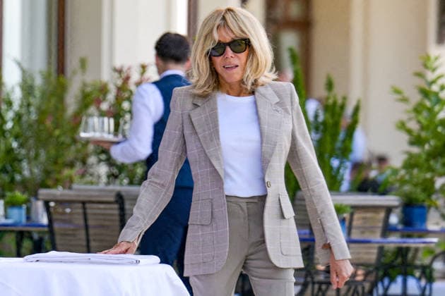 France’s First Lady, Brigitte Macron, is seen at the Hotel Royal in Evian reviewing the final details of the dinner tables on the hotel’s terrace, ahead of the evening reception following meetings held during the G7 Summit in Evian-les-Bains, France on June 15, 2026. The dinner is set to welcome heads of state, government officials, and invited guests attending the summit. Ammar Abd Rabbo Pool Bestimage Evian-les-Bains France,detected_source_language  Copyright: xAmmarxAbdxRabbo Pool BestimagexAmmarxAbdxRabbo Pool Bestimagex