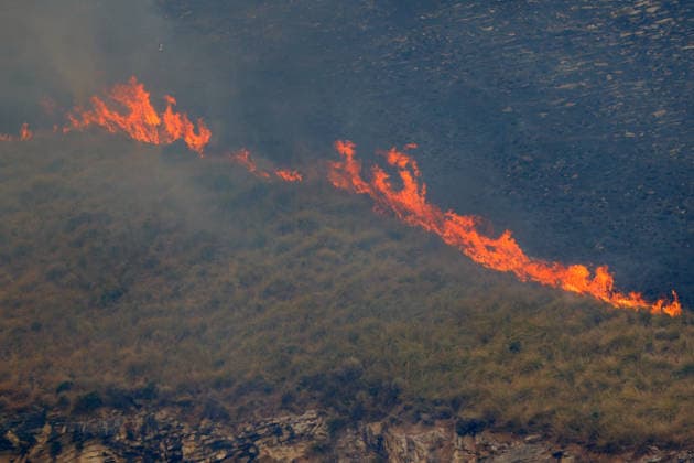 IPA85724860 - MONTAGNA GRANDE IN SALEMI, NEAR TRAPANI, HAS BEEN BURNING FOR THREE DAYS; 1,200 HECTARES OF FOREST HAVE GONE UP IN SMOKE. The photo shows the Montagna Grande forest destroyed by the flames; more than 1,200 hectares have gone up in smoke.  Copyright: xAlbertoxLoxBiancox xAlbertoxLoxBianco Fotogrammax 85724860