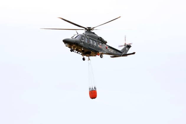 IPA85724861 - A MAJOR FIRE IN SALEMI, NEAR TRAPANI, HAS BEEN RAGING FOR THREE DAYS; 1,200 HECTARES OF FOREST HAVE GONE UP IN SMOKE. The photo shows an Air Force helicopter working to extinguish the fire.  Copyright: xAlbertoxLoxBiancox xAlbertoxLoxBianco Fotogrammax 85724861