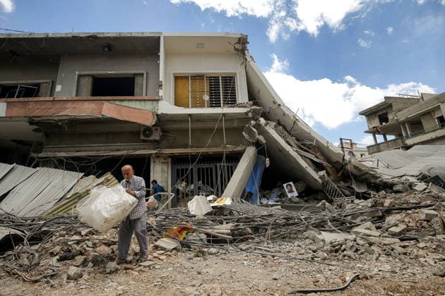 June 15, 2026, Nabatieh, Nabatieh, Lebanon: Lebanese Sayed Khalaf salavges material from his devastated shop in the southern Lebanese city of Nabatieh. Scores of families started to return to their villages following the announcement of an initial ceasefire agreement between the United States and Iran. Nabatieh Lebanon  - ZUMAn313 20260615_zip_n313_007 Copyright: xMarwanxNaamanix
