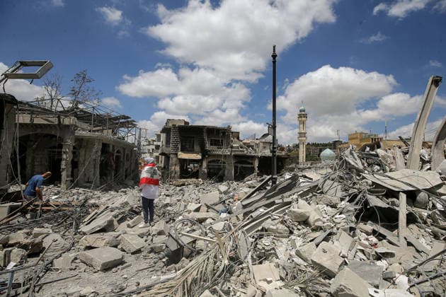 June 15, 2026, Nabatieh, Nabatieh, Lebanon: A Lebanese woman inspects destruction after returning to the southern Lebanese city of Nabatieh.. Scores of families started to return to their villages following the announcement of an initial ceasefire agreement between the United States and Iran. Nabatieh Lebanon - ZUMAn313 20260615_zip_n313_009 Copyright: xMarwanxNaamanix